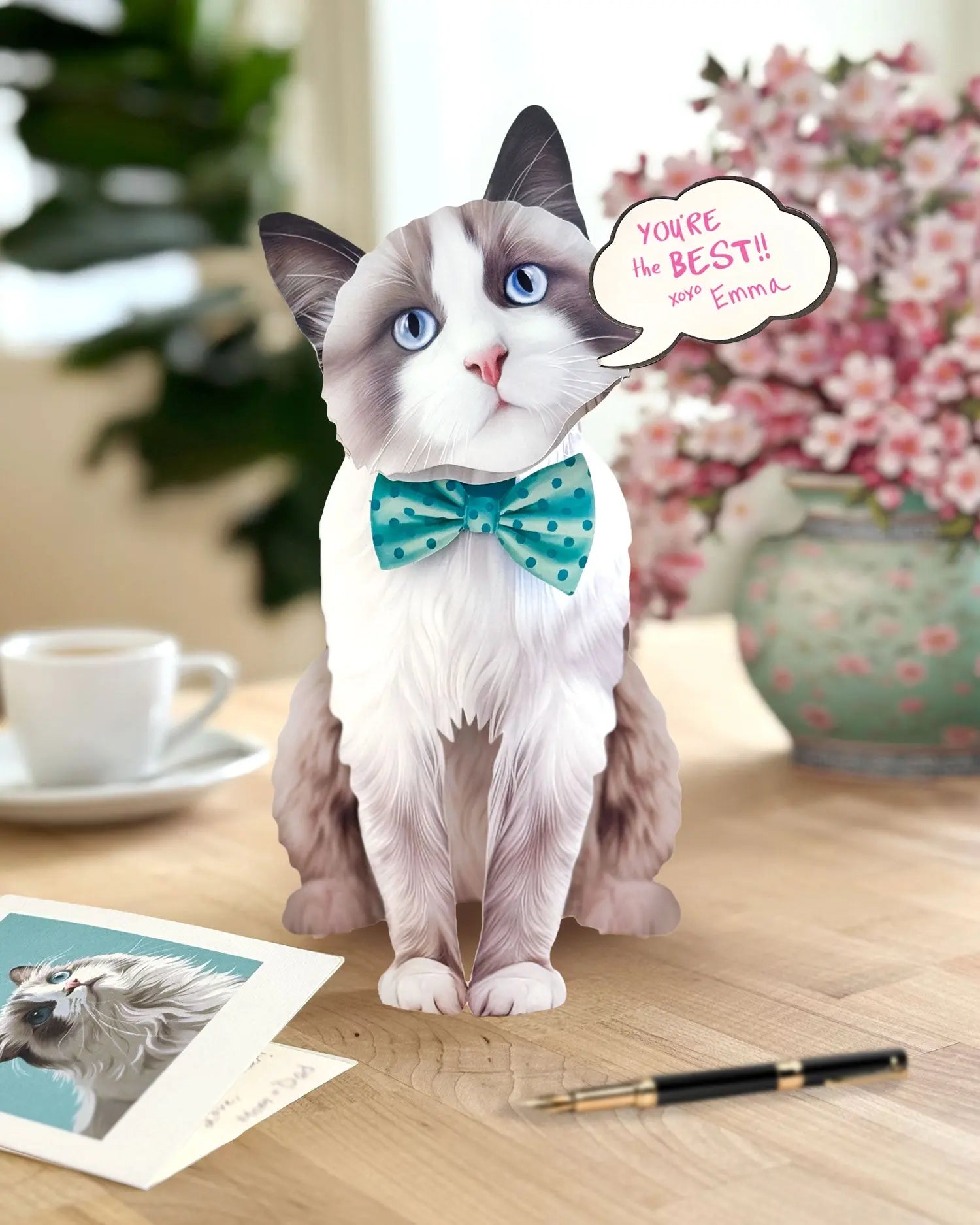 Freshcut paper Ragdoll cat pop-up card on desk