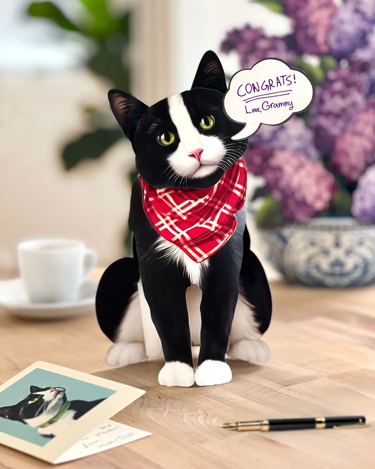 Freshcut paper Tuxedo cat pop-up card on desk