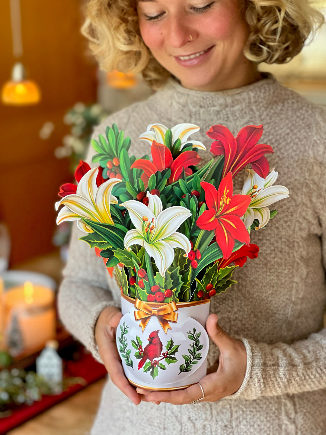 Winter Joy bouquet of lilies and holly