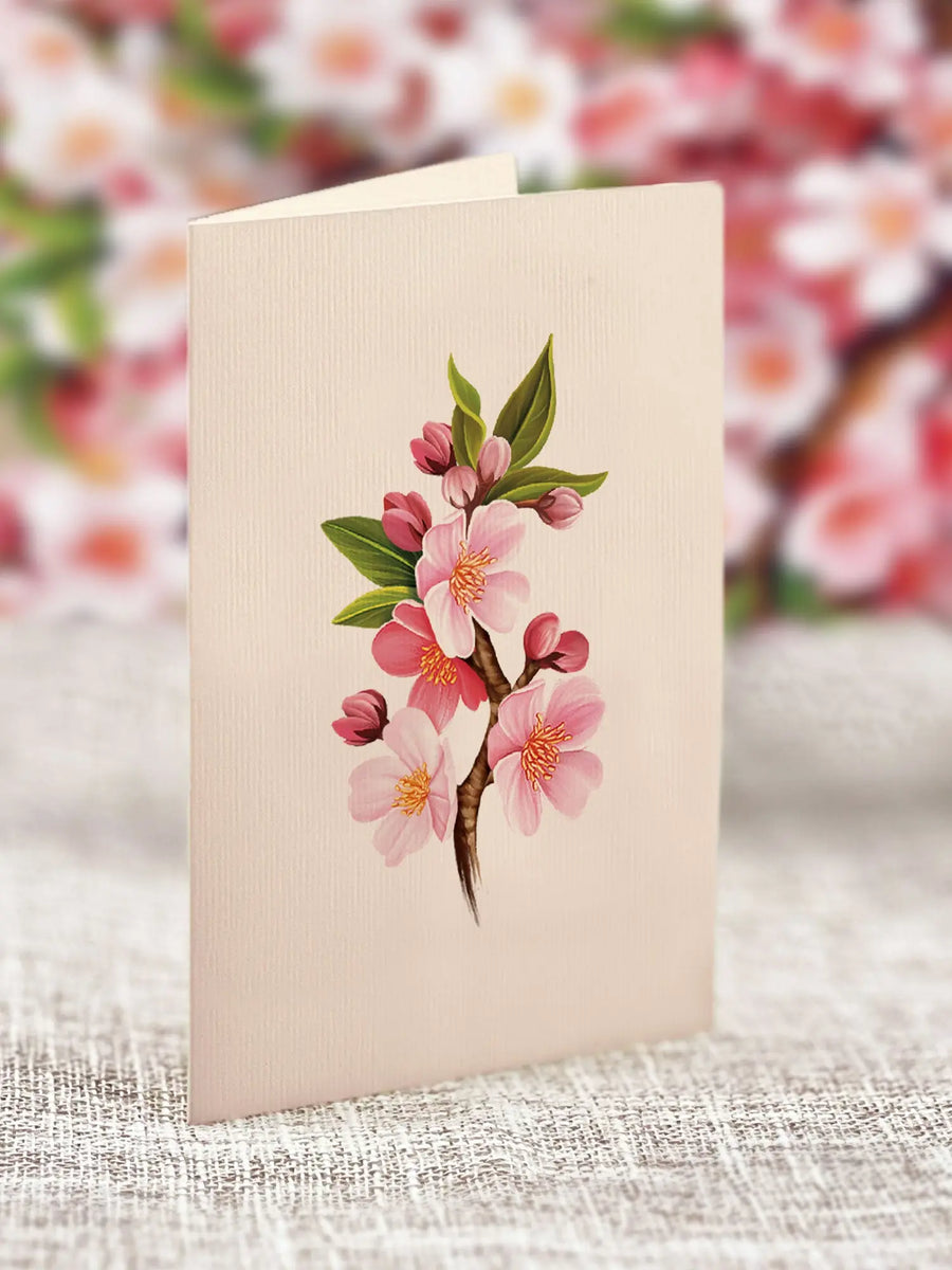a card with a flower design