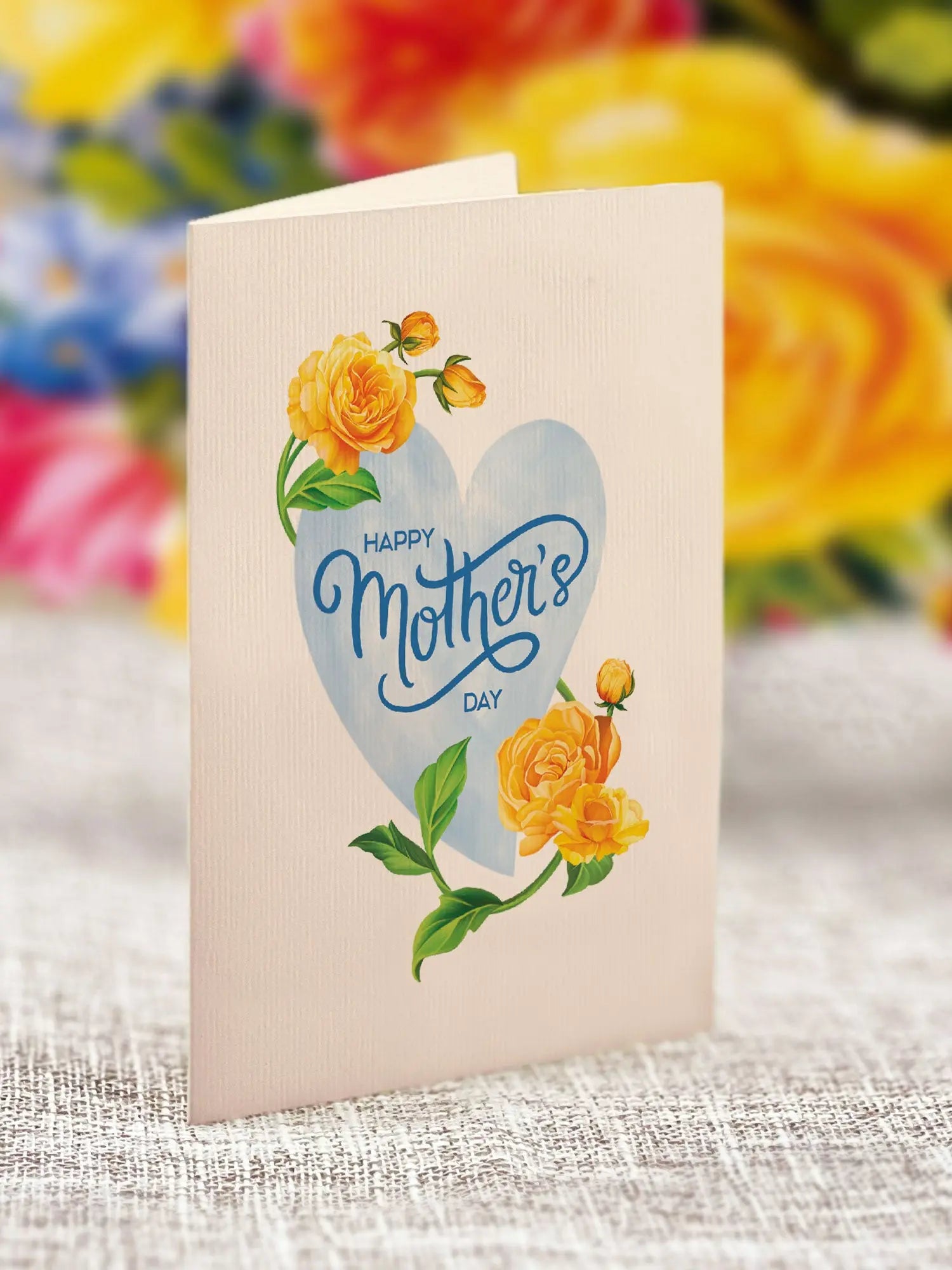 a card with a heart and flowers on it