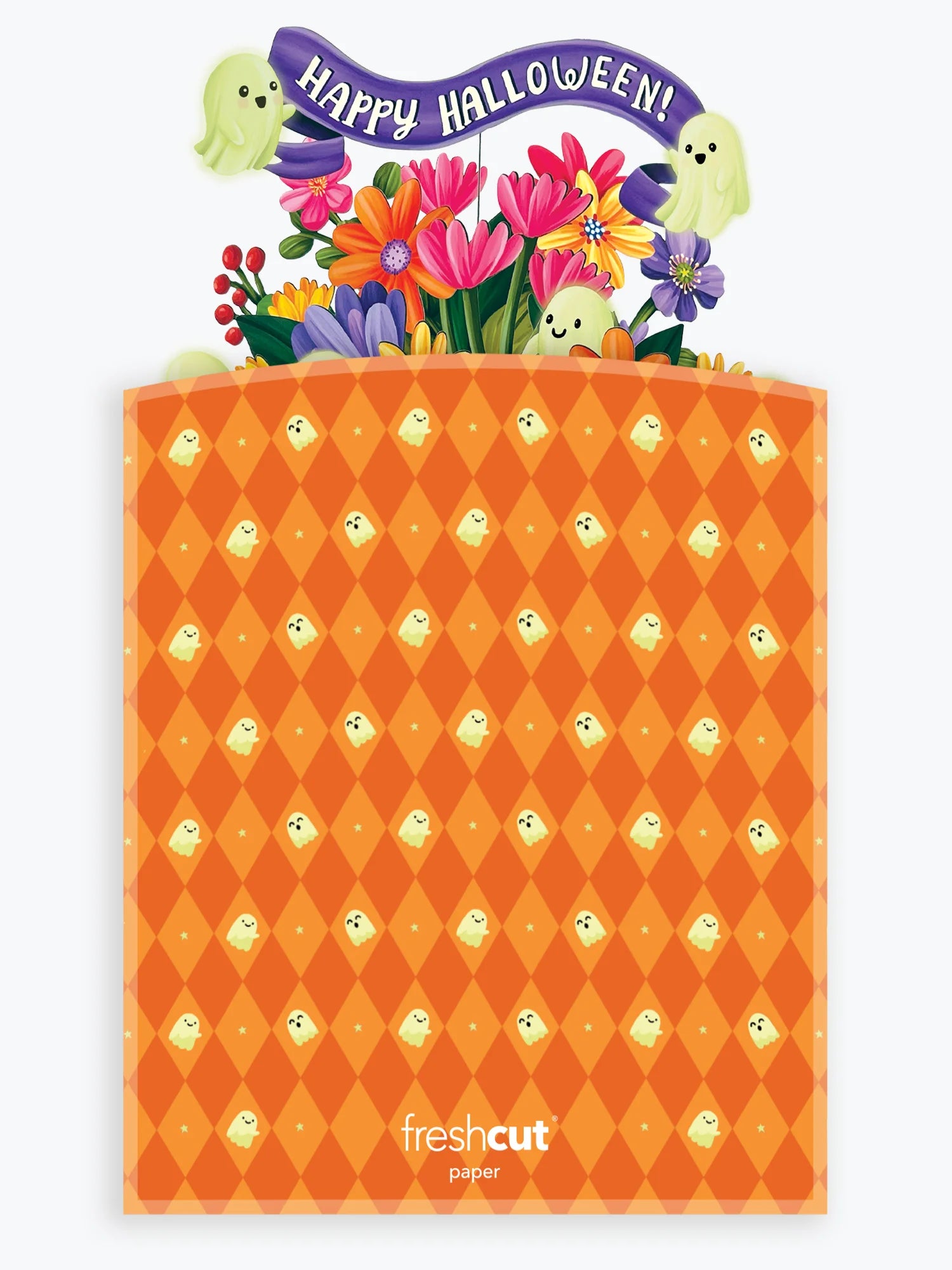 A Halloween-themed branded envelope bag packaging with an orange and yellow argyle pattern featuring small ghost motifs, with a colorful floral pop-up peeking out and a purple banner reading 'Happy Halloween!'.