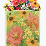 Vibrant florals with yellow, pink, and orange flowers in branded envelope packaging.