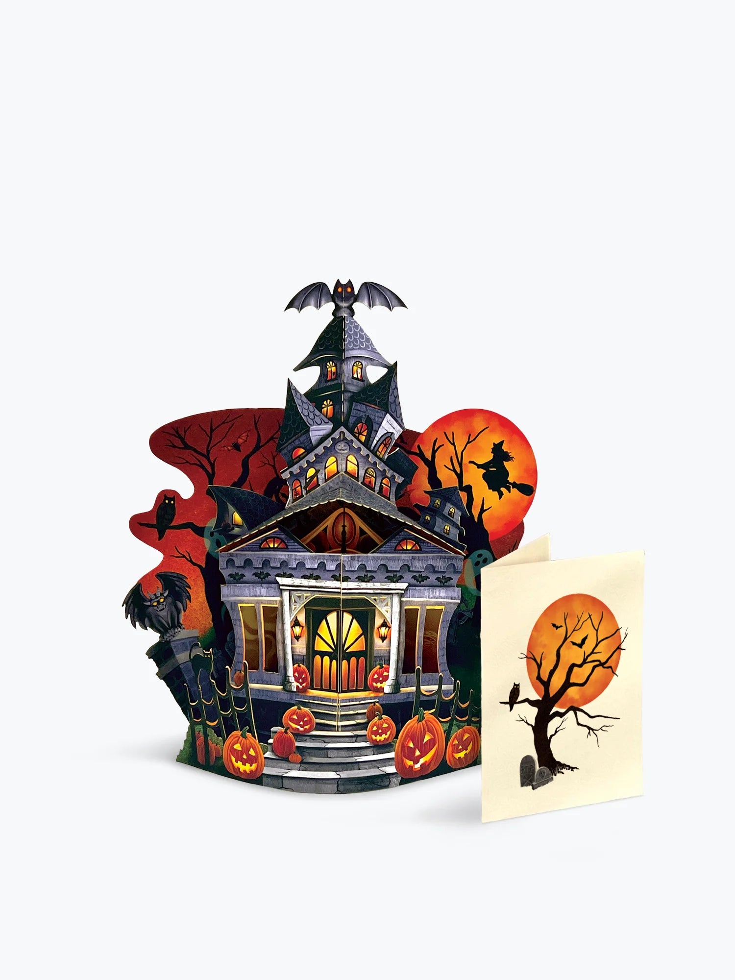 Halloween-themed pop-up card with a haunted house design on a light grey background