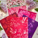 Garden Party Set featuring five pop-up flower bouquets with matching notecards and colorful envelopes.