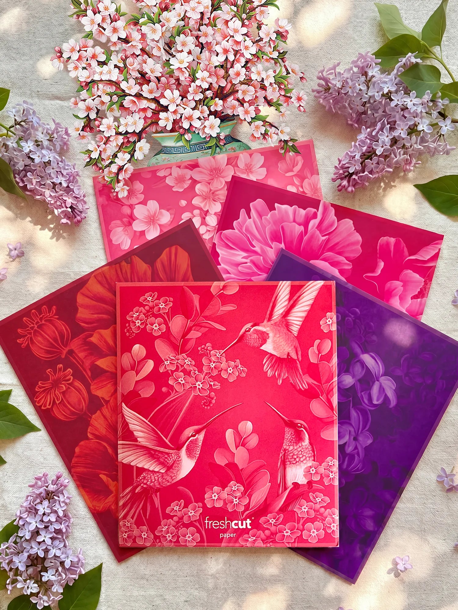 Garden Party Set featuring five pop-up flower bouquets with matching notecards and colorful envelopes.