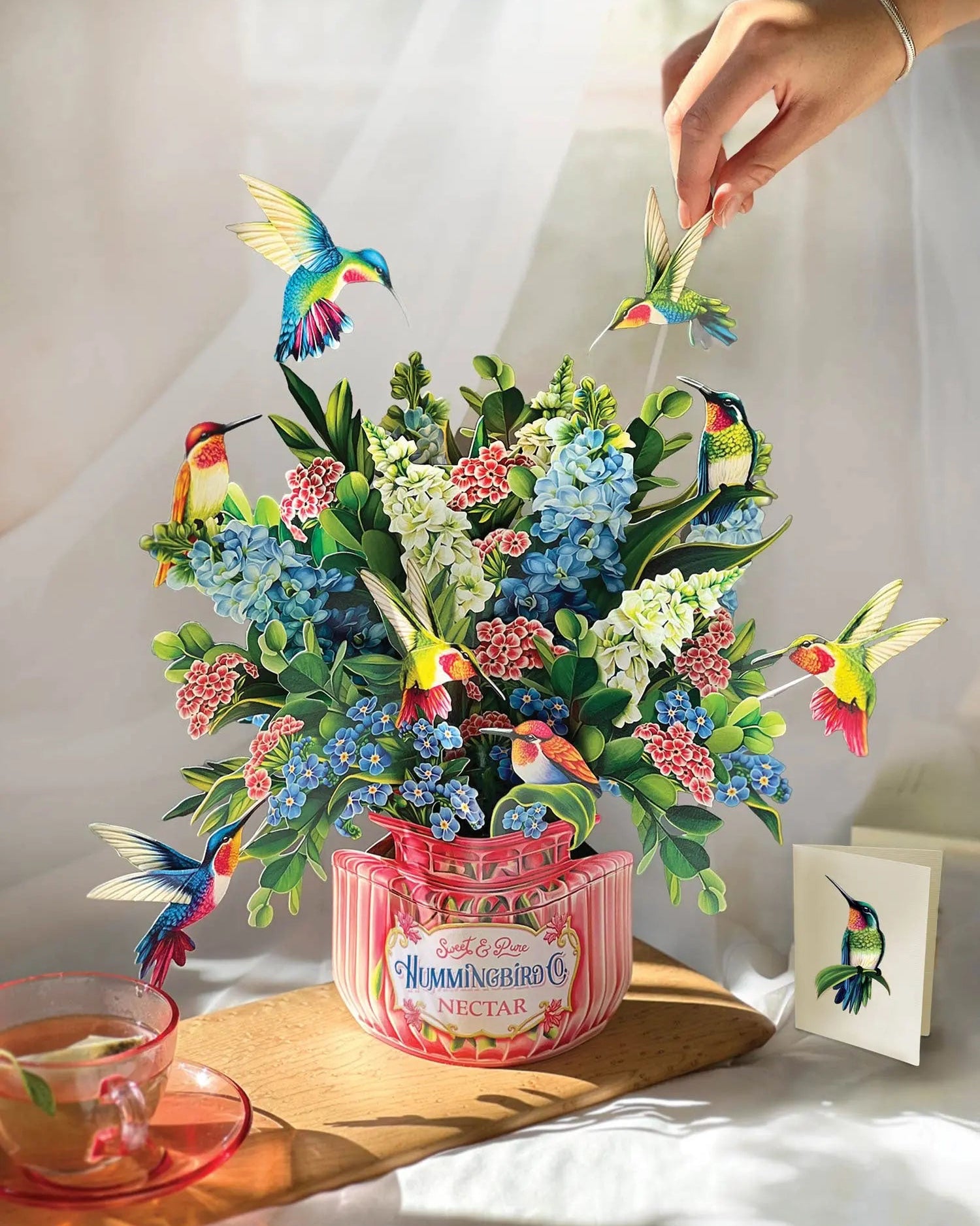 a bouquet of flowers and birds