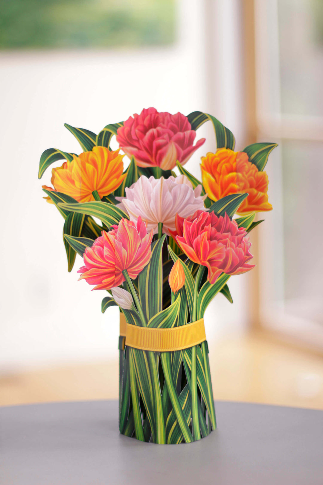 FreshCut Paper 3D pop up "Murillo Tulips" measure 12" tall by 9" wide. Our murillo tulips can stand alone or be used with the accompanying vase that comes with your bouquet. 
