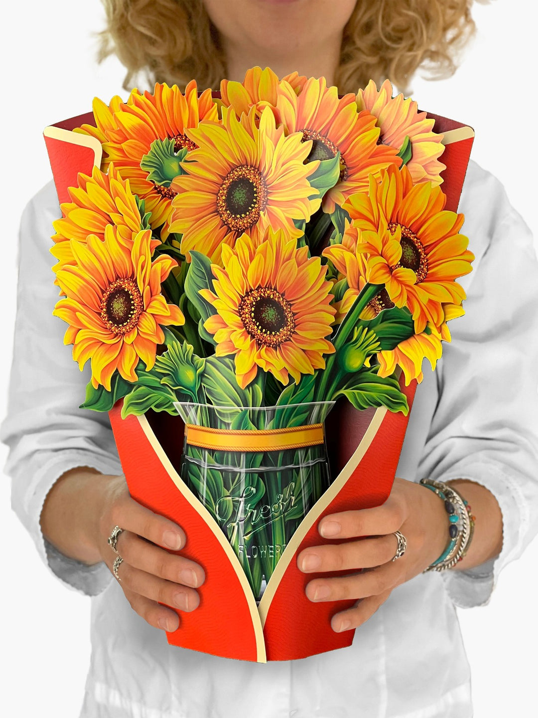 FreshCut Paper "Sunflowers" measure 12'' tall by 9" wide. Our stunning life sized, 3D pop up flowers include paper vase, matching note card and festive mailing envelope.