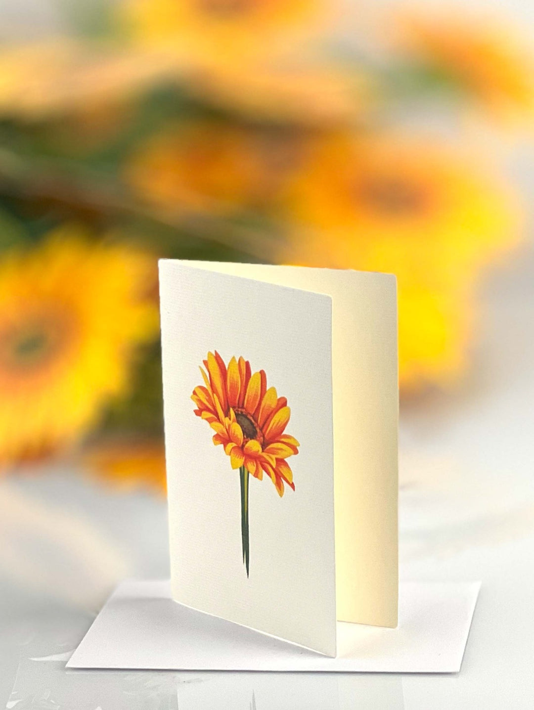 FreshCut Paper's 3D pop up Sunflower Grand paper flower bouquet include a matching 2.75" x 8" note card so you may write your own personal message to your gift recipient.