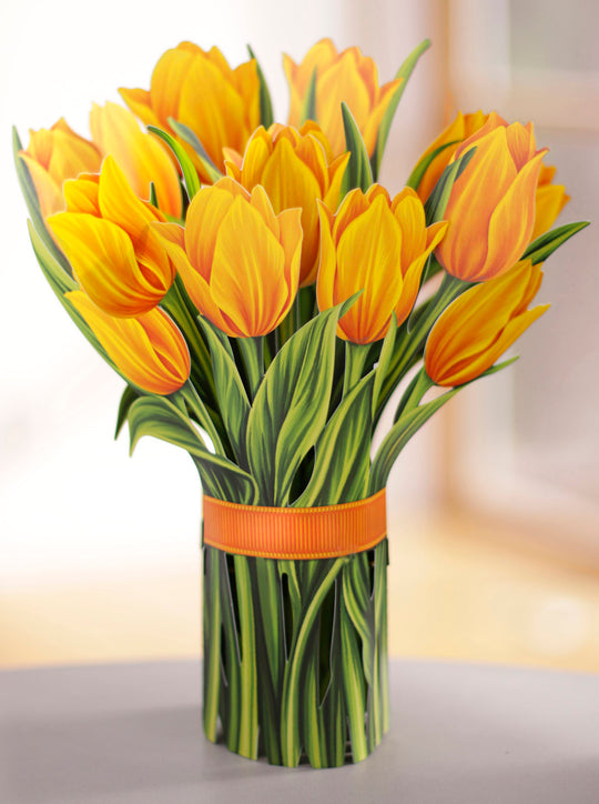 FreshCut Paper 3D pop up "Yellow Tulips" measure 12" tall by 9" wide. Our Yellow Tulips can stand alone or be used with the accompanying vase that comes with your bouquet.