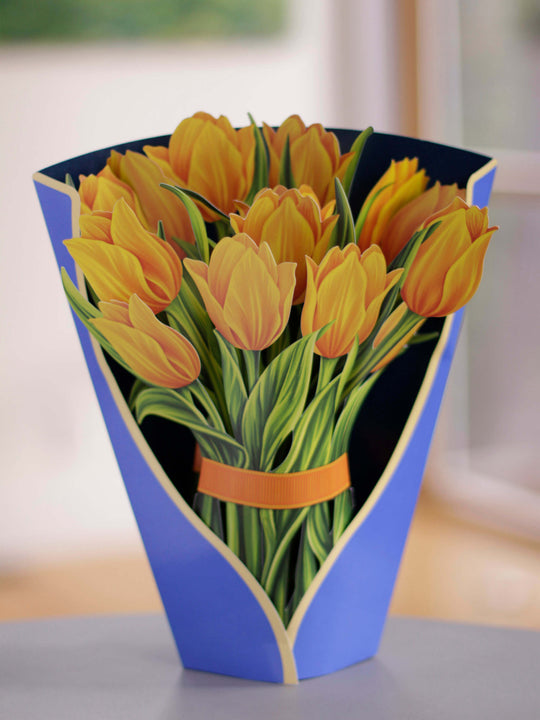 FreshCut Paper 3D pop up "Yellow Tulips" measure 12" tall by 9" wide. Our Yellow Tulips can stand alone or be used with the accompanying vase that comes with your bouquet. 