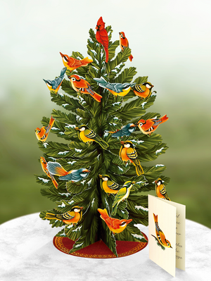 Celebrate the season with FreshCut Paper's snow-tipped balsam fir. With 36 colorful assorted birds included you can bring the the delightful landscapes of winter into your home. This pop-up tree is a great activity and tradition for your family. Create your unique tree and use season after season. 10x16”